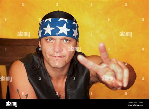 Native American man in rocking chair Stock Photo - Alamy