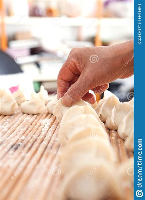 Chinese New Year Dumplings Indoors Stock Image - Image of traditional ...