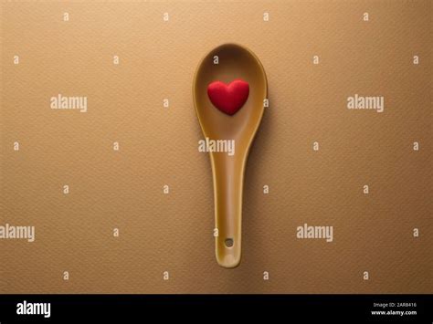 Red Heart shape in spoon Stock Photo - Alamy