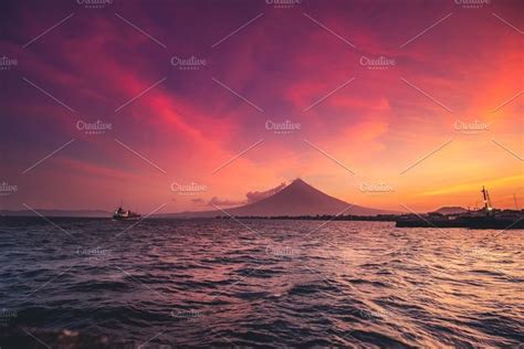 Great mayon volcano on luzon island stock photo containing sunset and ocean | Stock photos ...