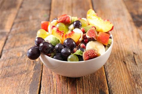 Bowl of juicy fruit salad stock photo. Image of juicy - 165526036