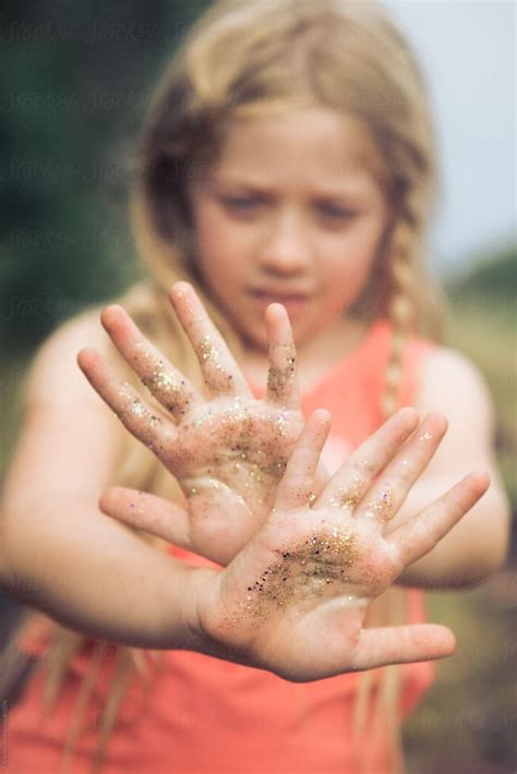 "Girl Showing Hands Covered In Gold Glitter" by Stocksy Contributor "Tahl Rinsky" | Gold glitter ...