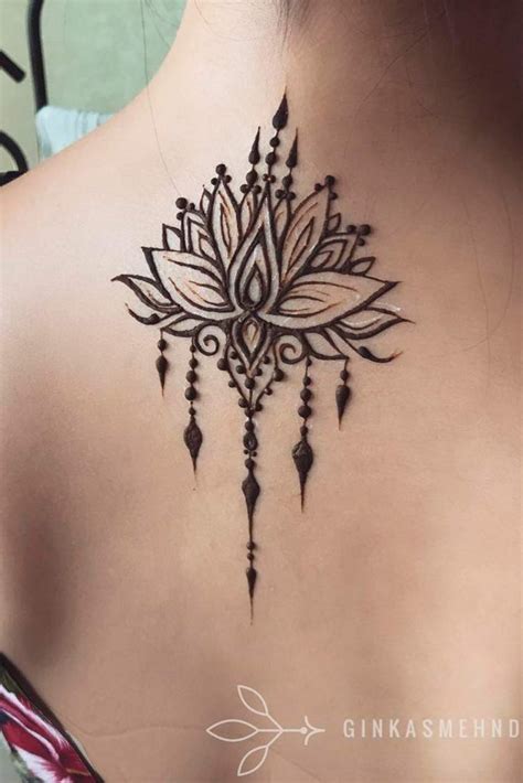 Top 71+ lotus flower tattoo on lower back - in.cdgdbentre