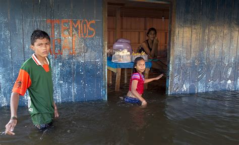 Photos: Amazon River overflows into Brazil’s streets | PBS News Weekend