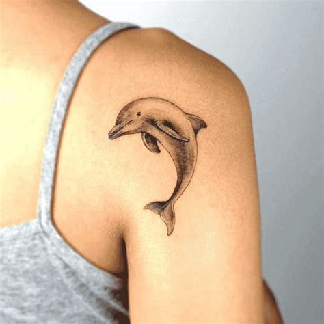 73 Simple Dolphin Tattoo Designs for Females - Tattoo Glee