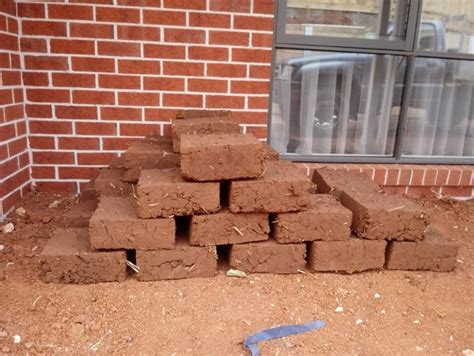 DRYING AND STORING MUD BRICKS