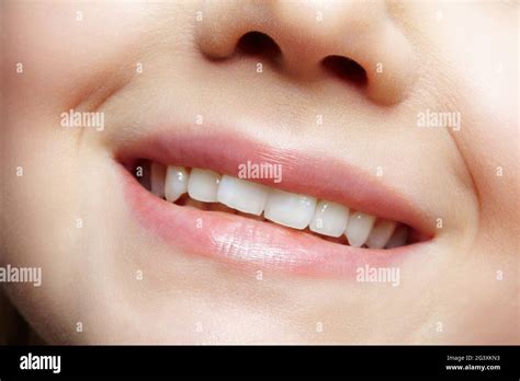 Human mouth and nose. Closeup macro portrait of young female teenager ...