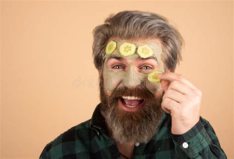 Funny Man with Clay Mask and Cucumber Slices on Face. Spa, Dermatology, Wellness and Facial ...