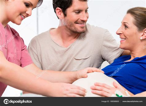 Pregnant Woman Her Man Delivery Room Hospital Stock Photo by ©Kzenon 188598900