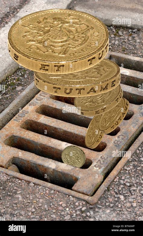 money down the drain Stock Photo - Alamy