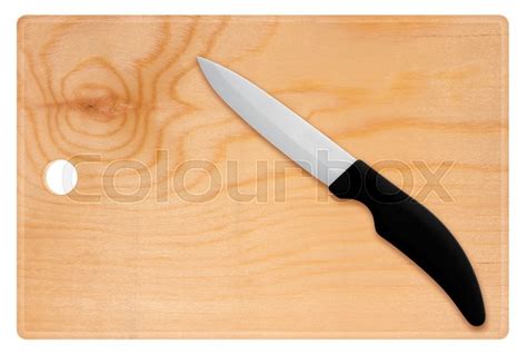 Wooden cutting board and knife isolated ... | Stock image | Colourbox