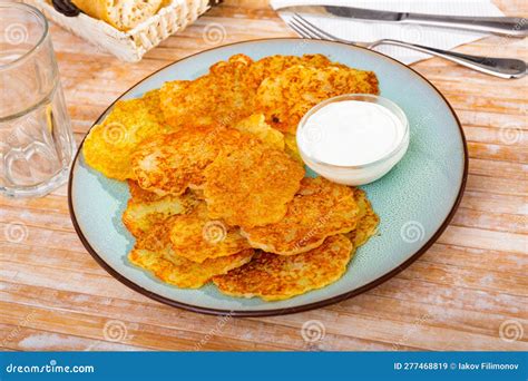 Belarusian Potato Pancakes (draniki) with Sour Cream Stock Image ...