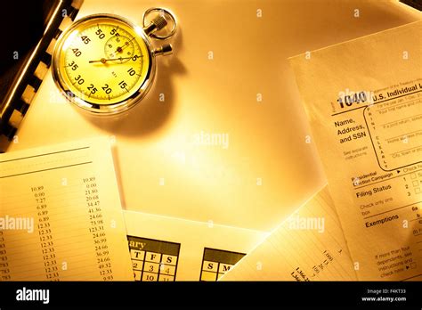 Annual budget, calendar, stopwatch and audit Stock Photo - Alamy