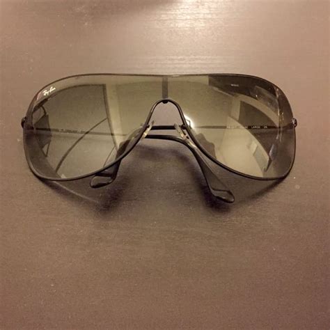 RAY BAN LUXOTTICA SUNGLASSES 32021 AGORDO (BL) ITALY, Luxury, Bags & Wallets on Carousell