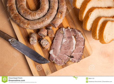 Sliced Roasted Traditional Homemade Sausage with Spices and Herb Stock ...