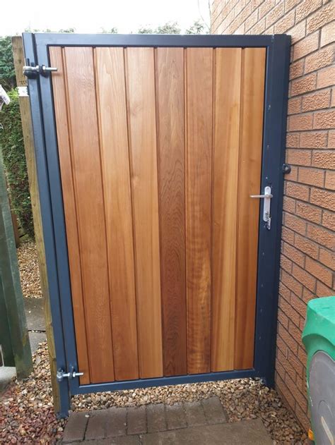 A beautiful metal framed cedar side gate, designed, manufactured and installed 😍 Gates & Metal ...