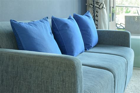 Blue Color Scheme Living Room With Pillows And Sofa Stock Photo ...