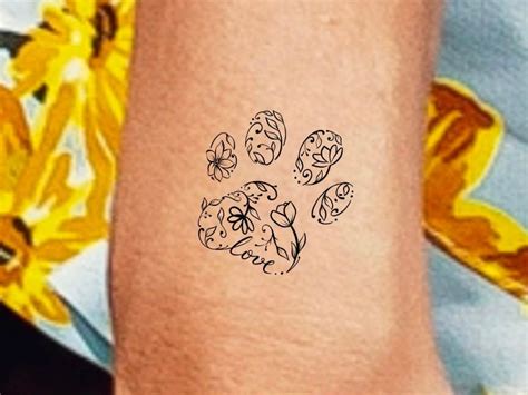 Dog paw print outline tattoo photos