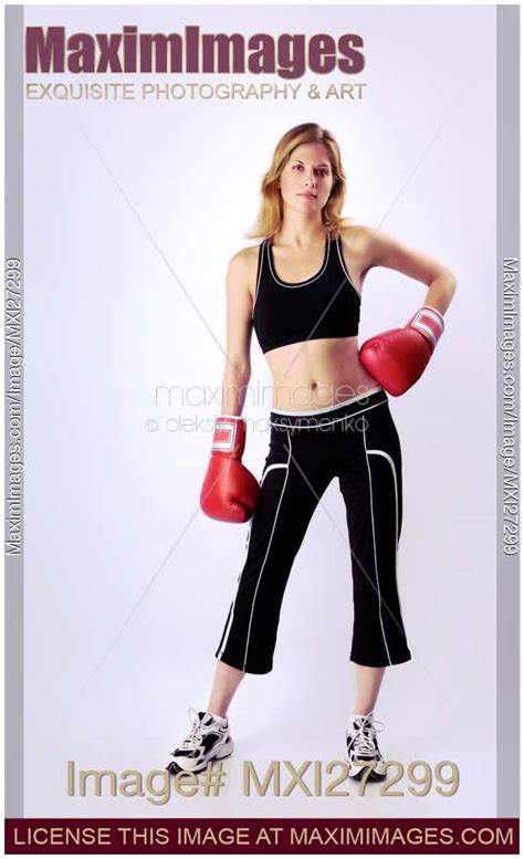 Photo of Young woman wearing boxing gloves | Stock Image MXI27299