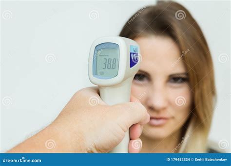Infrared Thermometer At Entrance Of Commercial Shop To Scan Visitor Temperature Stock Image ...