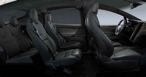 Tesla updates Model X with new front seats for more space and seat pockets | Electrek