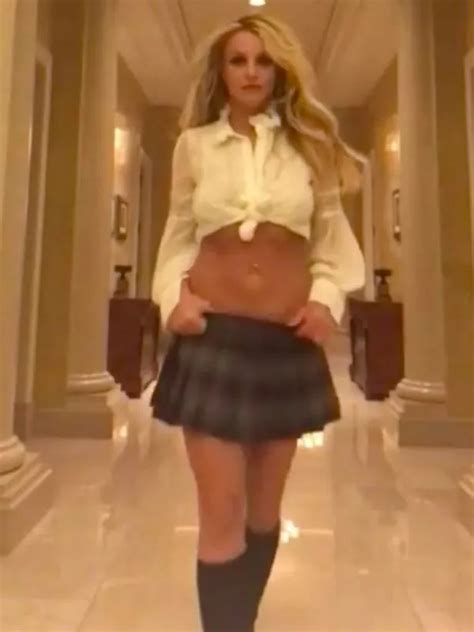 Britney Spears slips into ab-baring schoolgirl outfit nearly 20 years ...