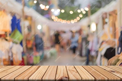 Premium Photo | Blank brown wooden table on front blurred market background