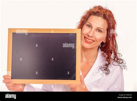 girl wearing medical gown holding blank black chalkboard isolated on ...
