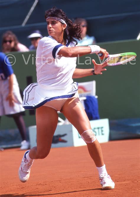 Gabriela Sabatini of Argentina returns a shot during ladies singles ...