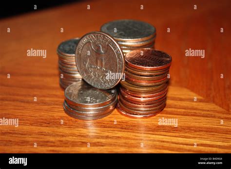 US Currency coins- quarters, cents dime Stock Photo - Alamy
