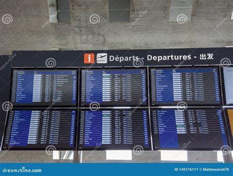 Paris, France. Monitors with Departures and Arrivals Flights at Charles De Gaulle International ...