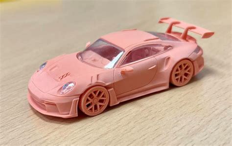 FIRST LOOK: MINI GT Porsche 911 GT3 RS! • DiecastSociety.com