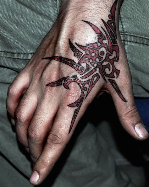 35 Beautiful Hand Tattoo Designs