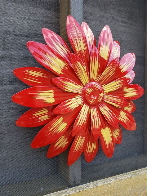 "Hawaii and Alaska Please message us for cost to ship. This beautiful metal wall flower would ...