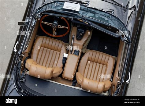 Open roadster, two beige leather seats, Jaguar E-Type, British vintage car Stock Photo - Alamy