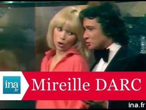 Michel Sardou et Mireille Darc "Requin chagrin" - (live) Archive vidéo INA | Michel sardou ...