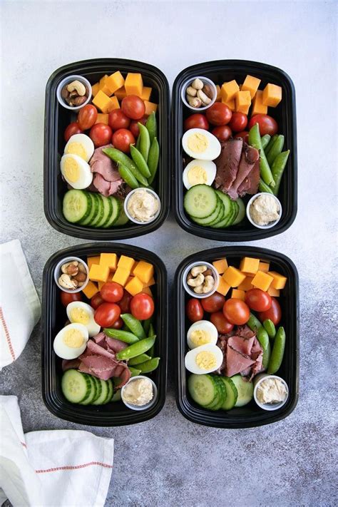 Four prepared high protein snack packs filled with heathy veggies and high protein snacks | Meal ...