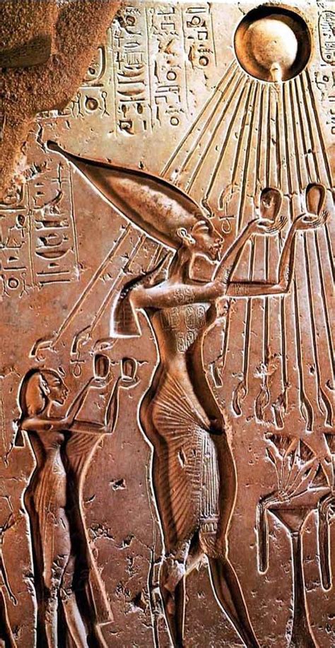 King Akhenaten and his wife Nefertiti praying to the sun-god Aten who ...