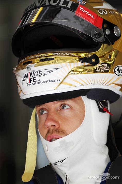 Sebastian Vettel's new gold helmet design