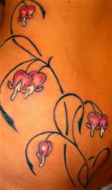 Pin by Wendy Ewing on Tattoos | Bleeding heart tattoo, Bleeding heart flower, Butterfly tattoo ...