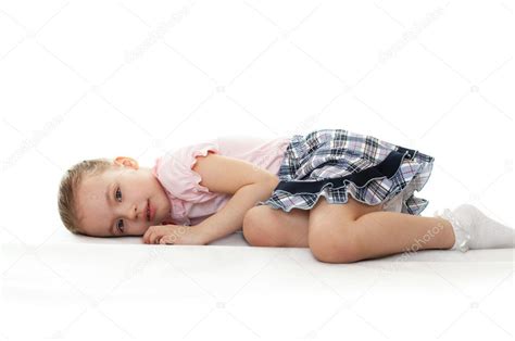 Little girl is lying. — Stock Photo © yykkaa #5304905