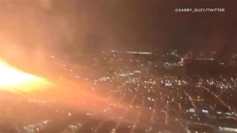 LAX-bound plane makes emergency landing after flames appear to shoot ...