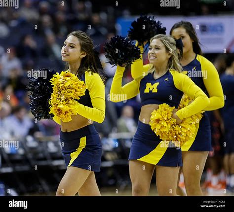 March 9, 2017: Michigan Cheerleaders perform during a Big 10 Men's Basketball Tournament game ...