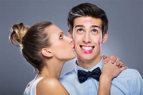 What does it mean when a girl kisses your cheek? | Body Language Central