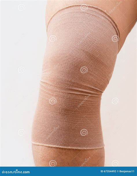 Twisted knee stock photo. Image of physical, hand, holding - 67354492