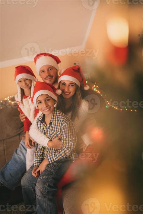 Happy Family At Christmas Holiday 14149379 Stock Photo at Vecteezy