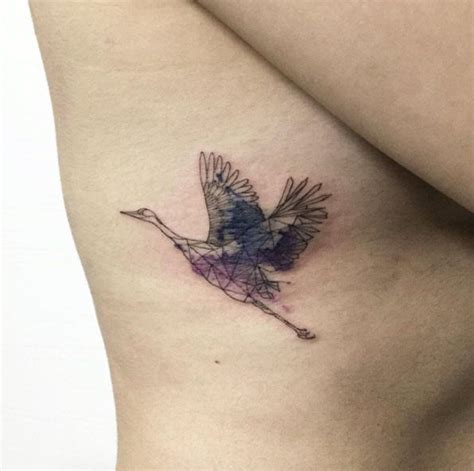 40+ Beautifully Designed Tattoos for Women - TattooBlend | Tattoos, Crane tattoo, Unique tattoos