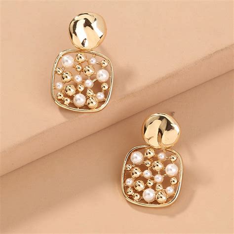 Brighten up your jewelry collection with these artful earrings boasting ...