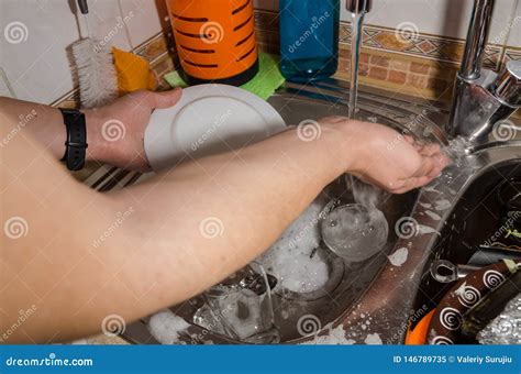 Washing a plate stock image. Image of clean, detergent - 146789735