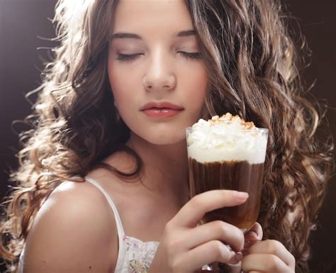 Premium Photo | Girl with glass of coffee witn cream